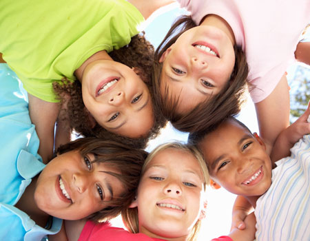 smiling children with sealants