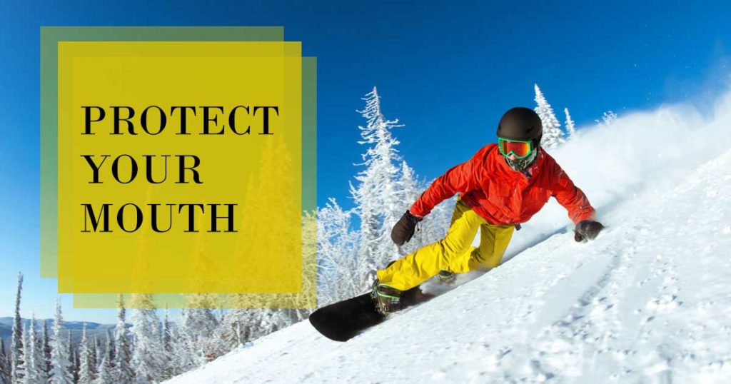 protect your teeth snowboarder on mountain